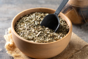 psyllium, traditional-yerba-mate-wooden-bowl-wooden-table